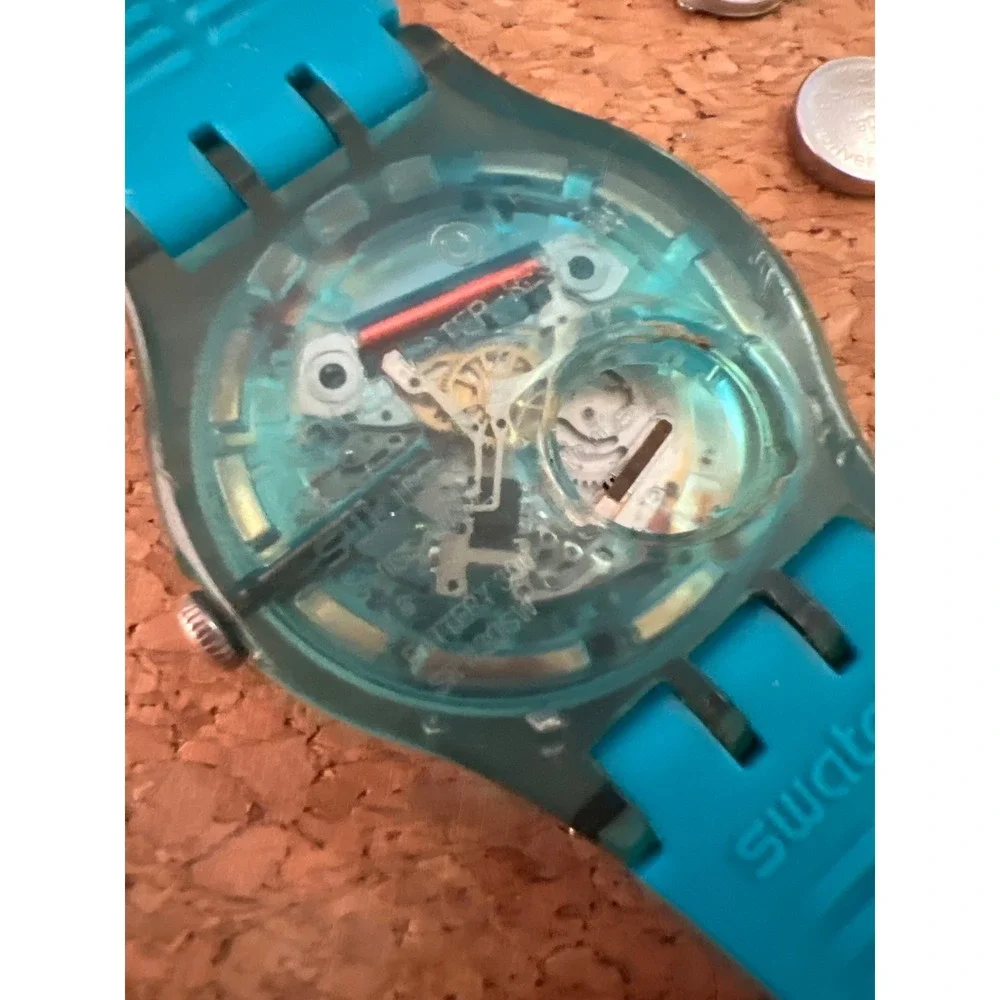 Swatch Blue Rebel SUON700 Day Date Blue Dial Silicone Strap Watch Vintage Swiss